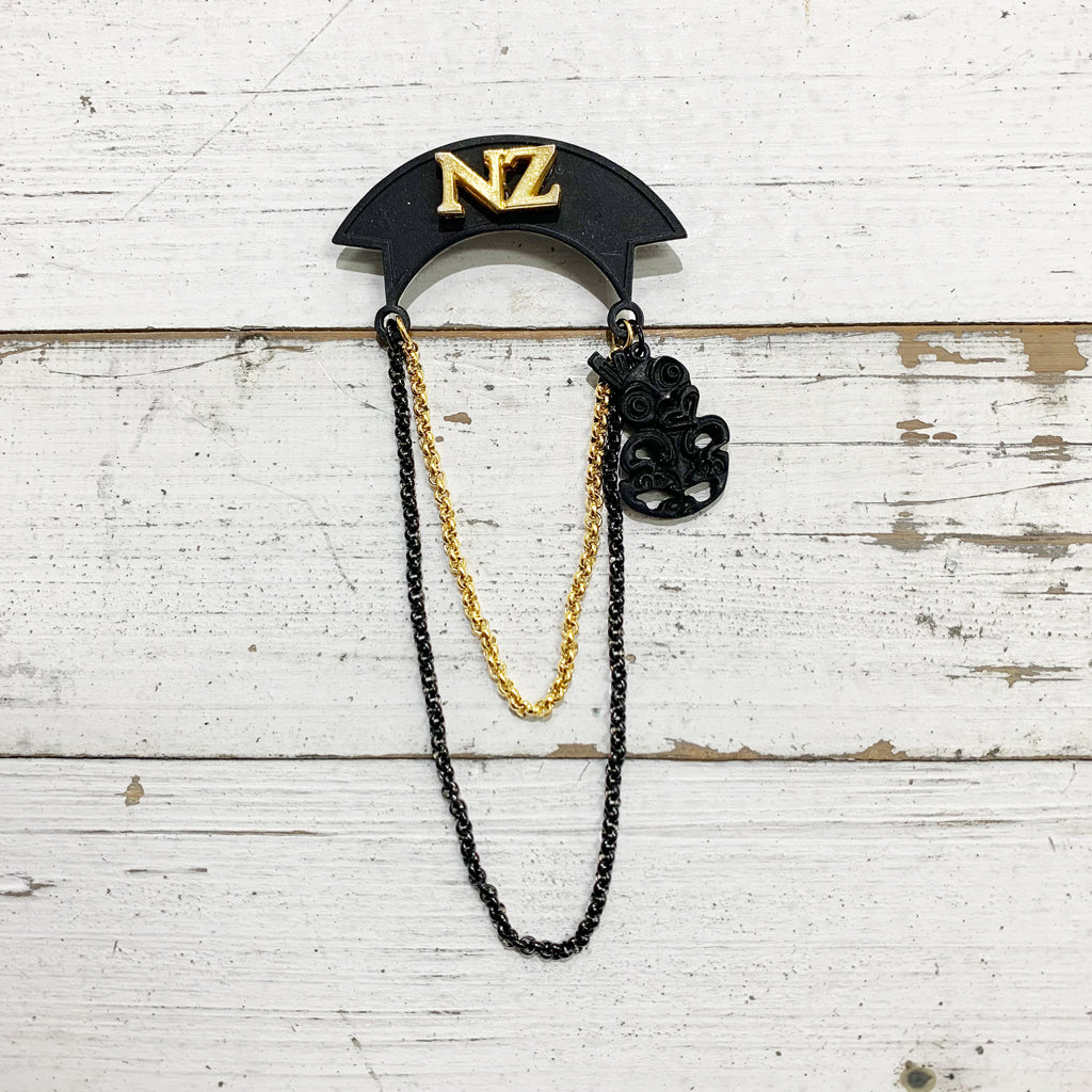 Mia Black Ribbon Brooch With Tiki Chain