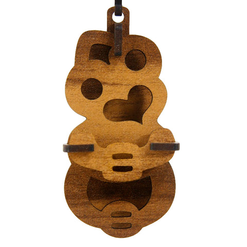 Assembled Abstract Design Wood Tiki Christmas Decoration.
