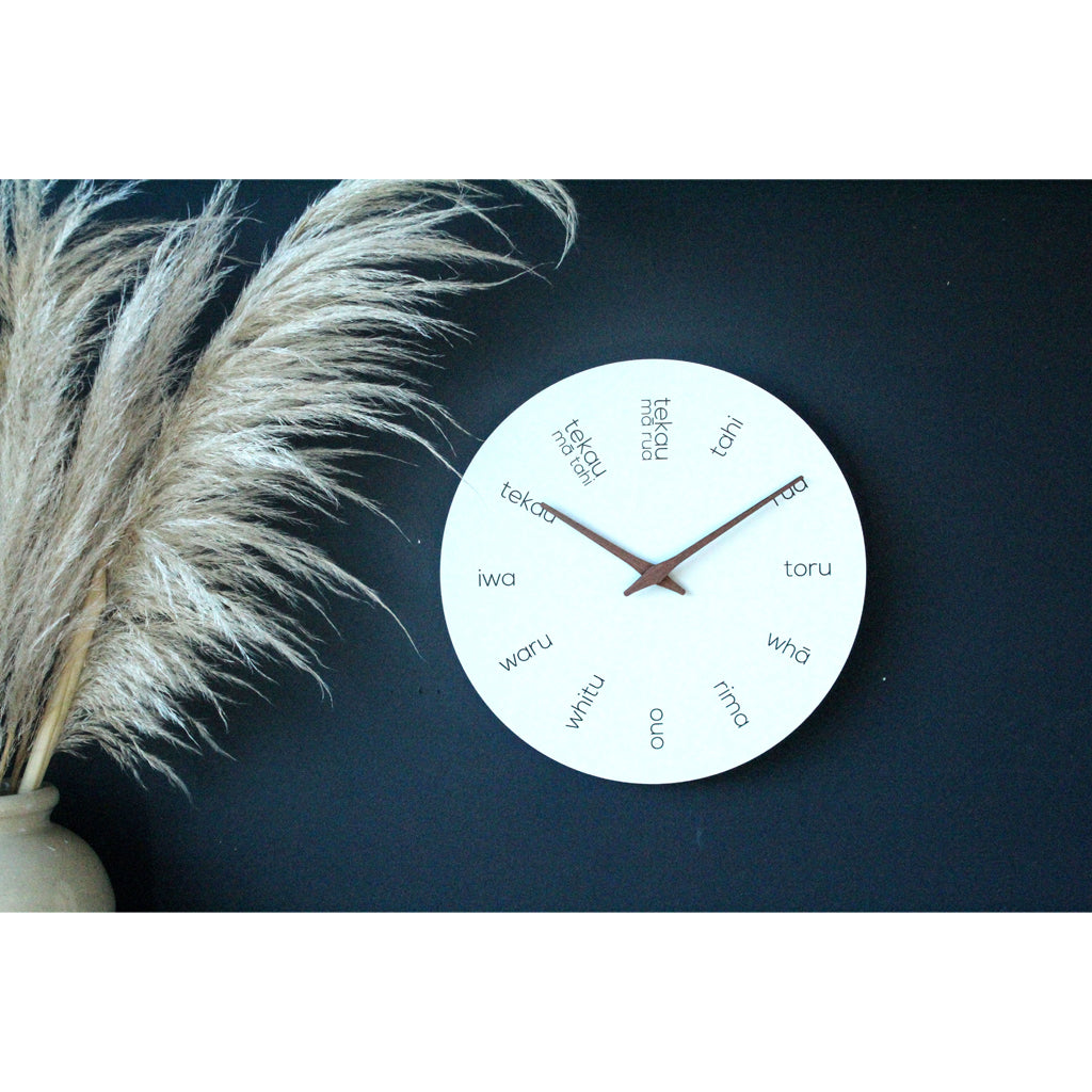 Lifestyle image of Moana Road Te Reo Māori Wooden Clock.