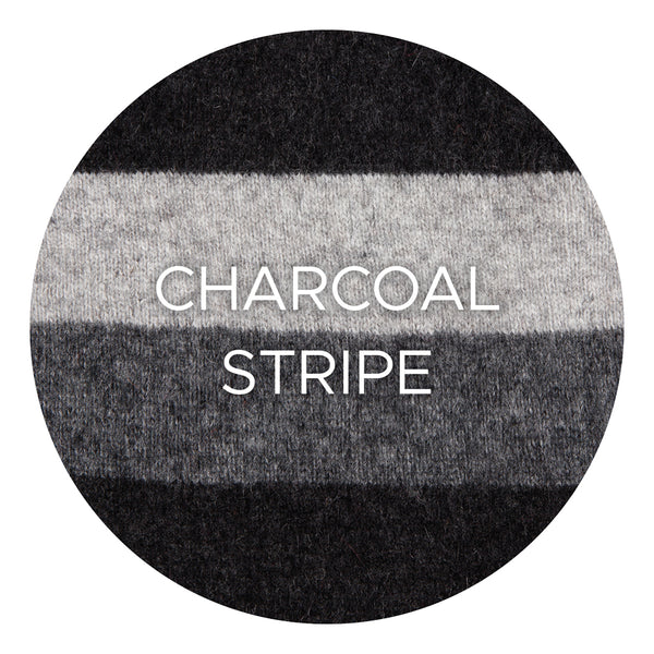 Swatch of Native World Charcoal Stripe colourway.